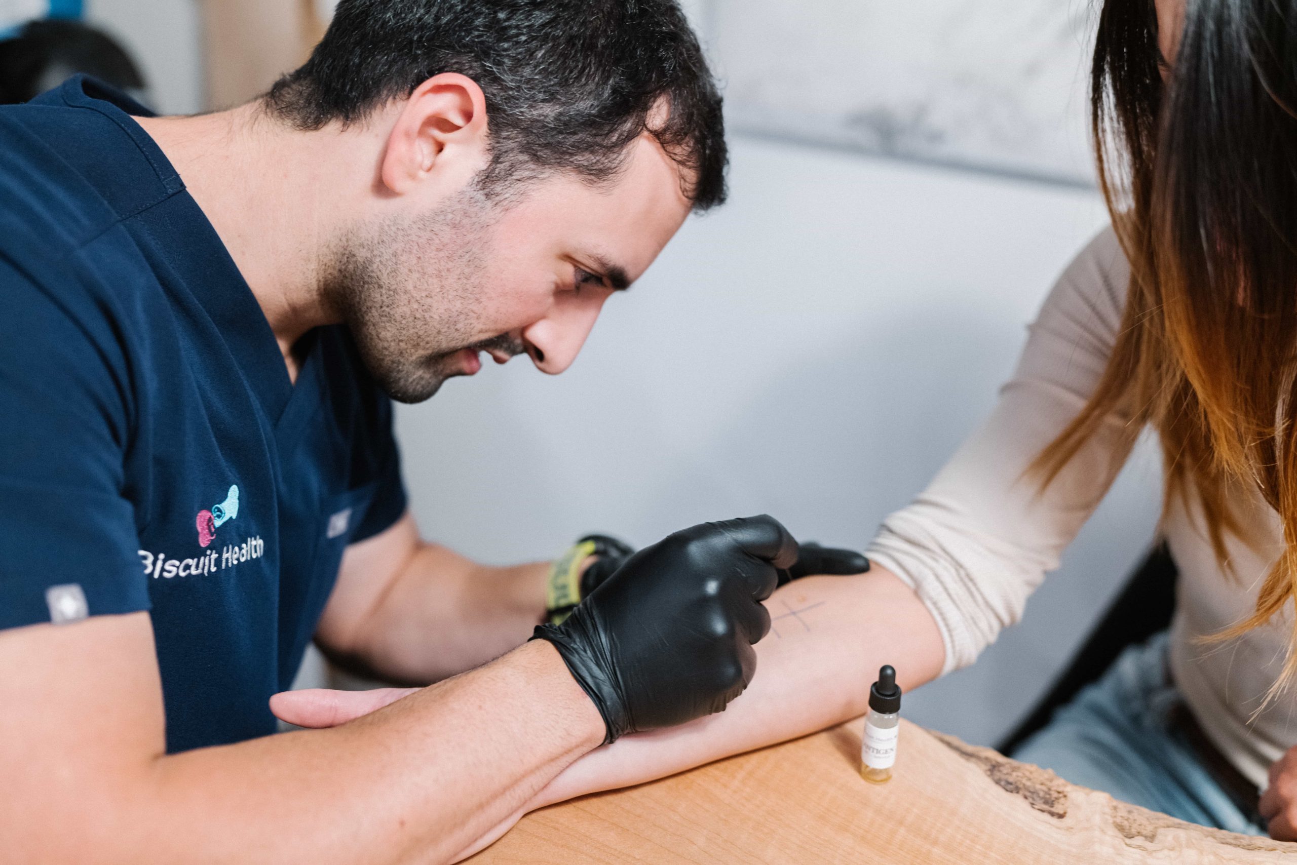 Biscuit Health nurse performing a skin-prick allergy test at home